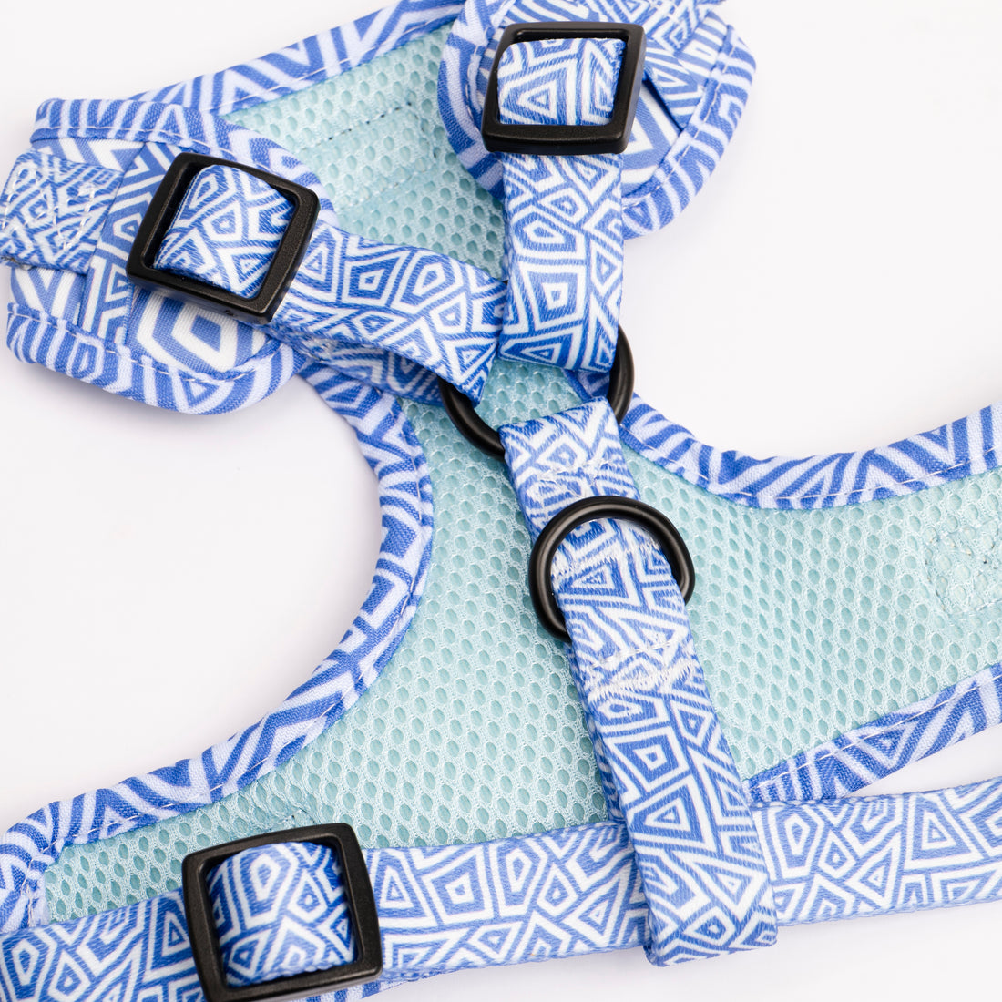 Blue and white geometric pattern adjustable pet harness with breathable mesh lining and multiple adjustment buckles