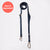 A navy blue leather dog leash with silver metal hardware, displayed vertically on a light gray background with a red circular 'New Colour!' badge in the top left corner.