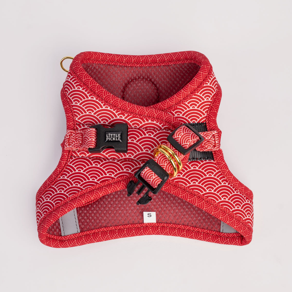 Red oriental wave patterned cat harness on a light gray background